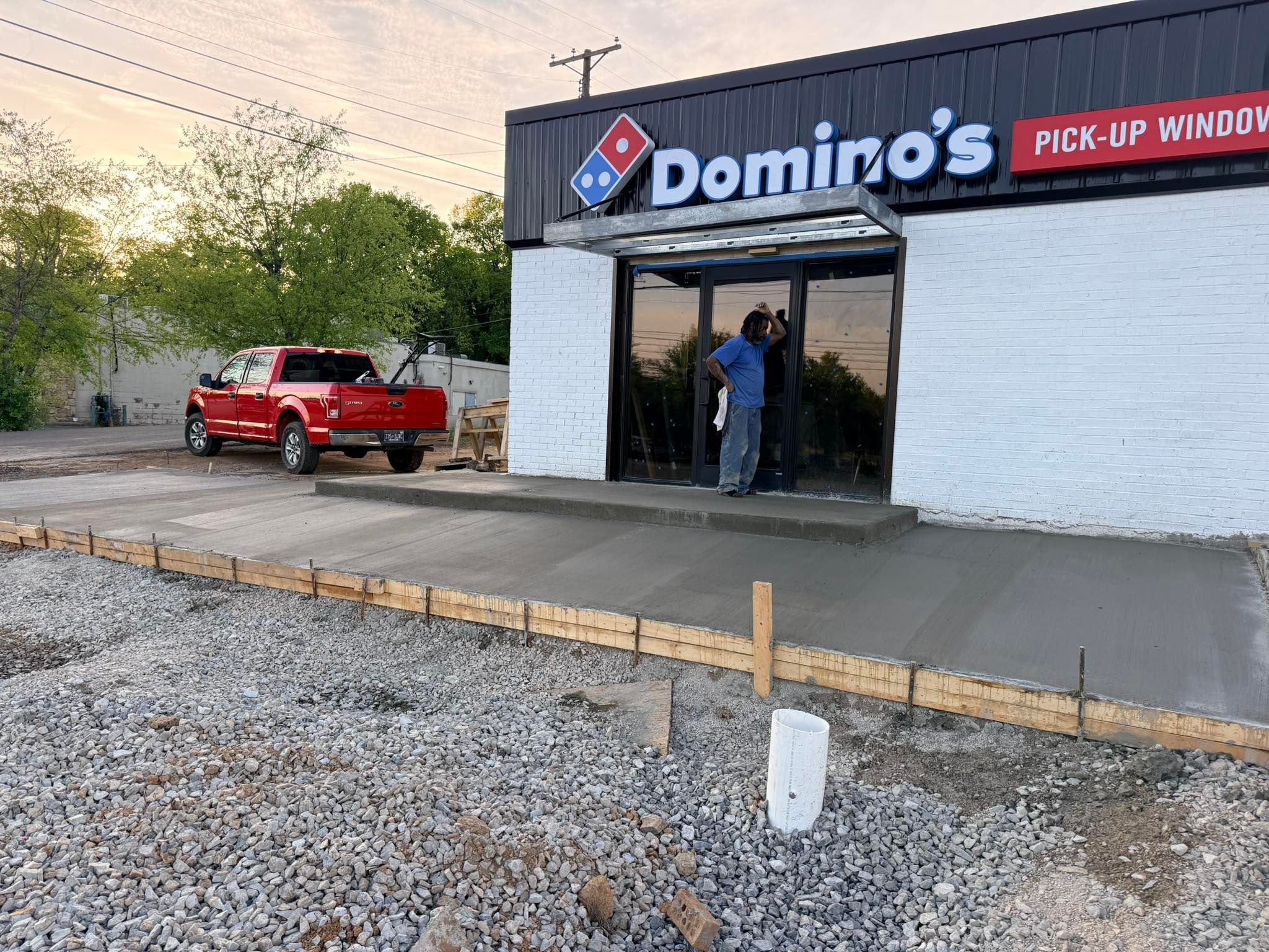 Fresh commercial concrete entrance pad